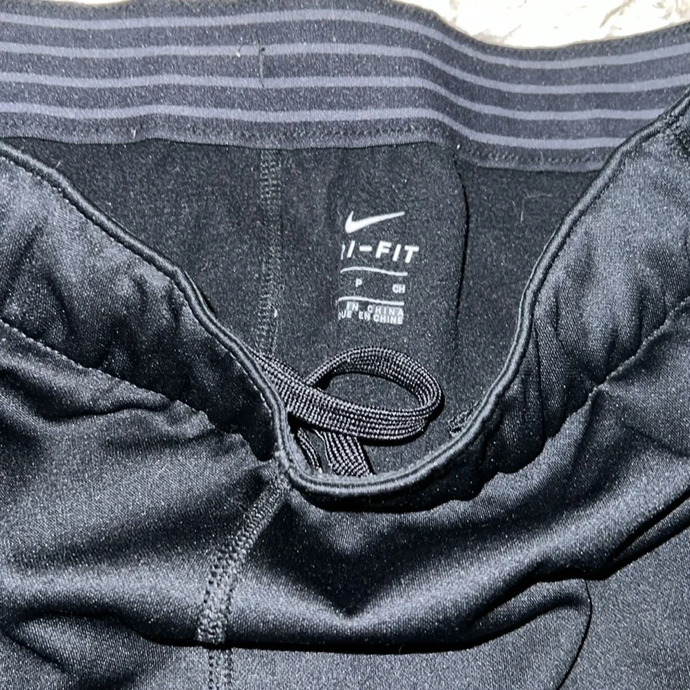 Like new Nike dri fit black pants with pockets
